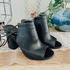 Aldo black mules with tie detail